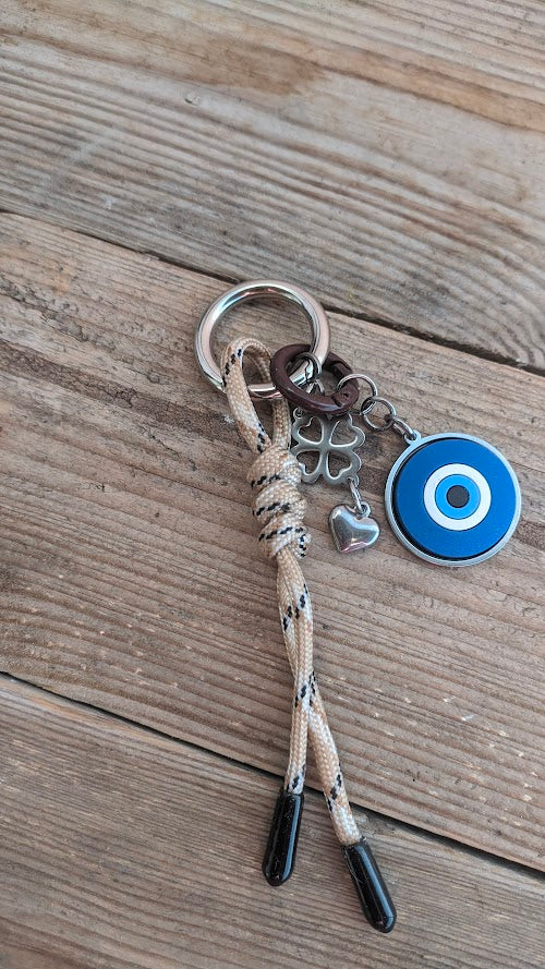 Bijou de Sac Oeil Bleu et trèfle en Acier Inoxydable