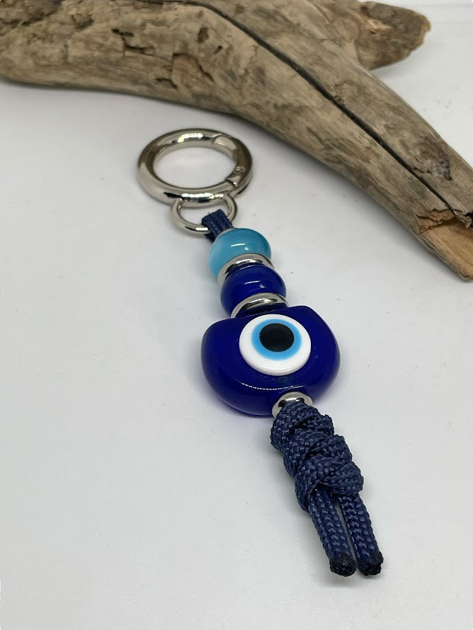 Blue Evil Eye Bag Charm – Elegance & Protection