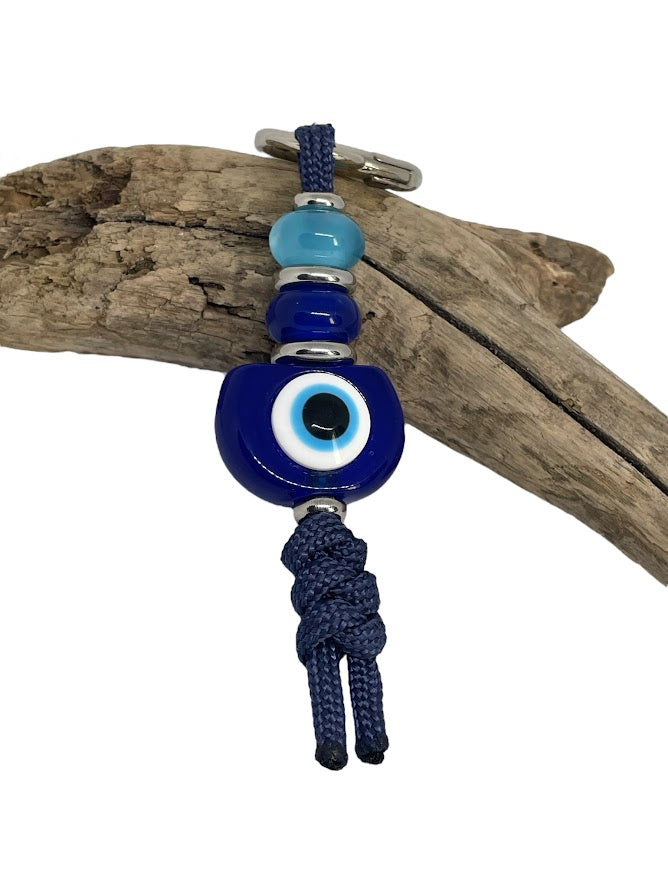 Blue Evil Eye Bag Charm – Elegance & Protection