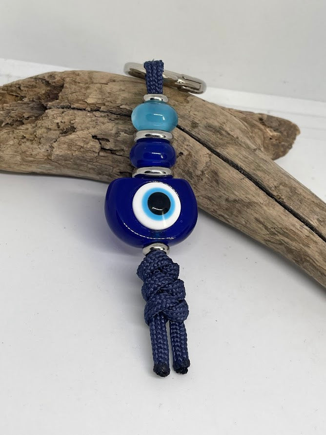 Blue Evil Eye Bag Charm – Elegance & Protection