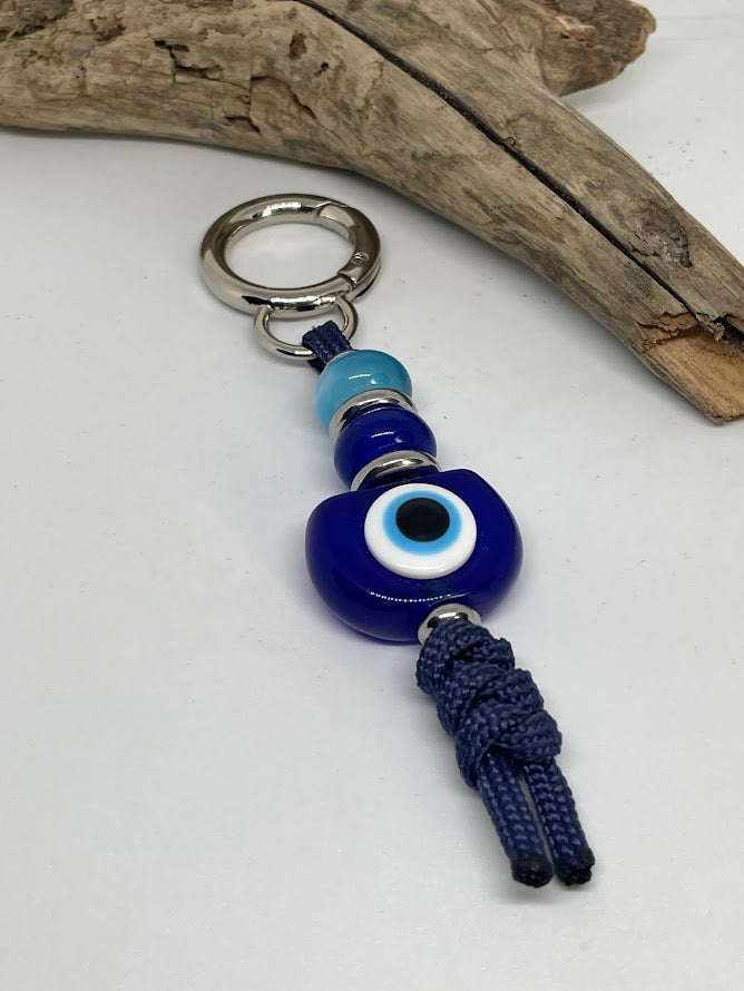 Blue Evil Eye Bag Charm – Elegance & Protection