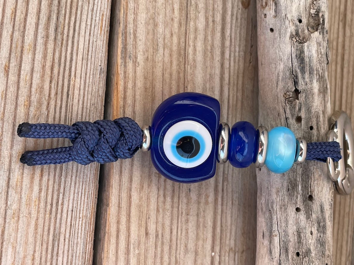 Blue Evil Eye Bag Charm – Elegance & Protection