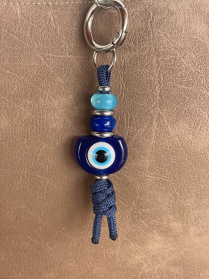 Blue Evil Eye Bag Charm – Elegance & Protection