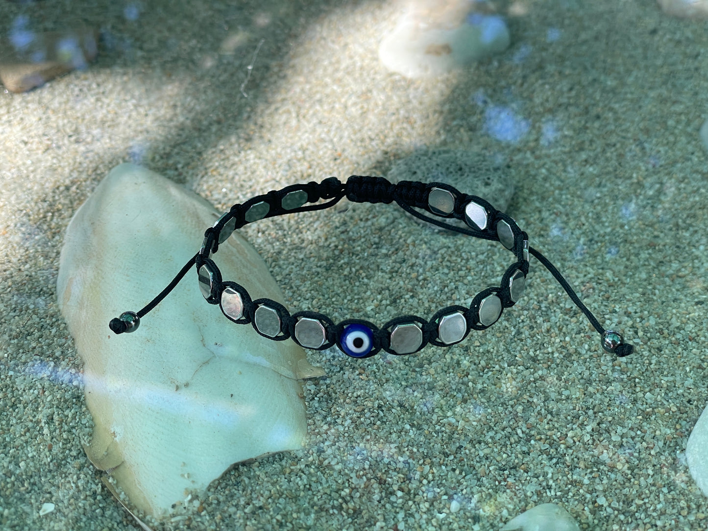 Blue Eye & Silver Hematite Bracelet – Protection & Elegance