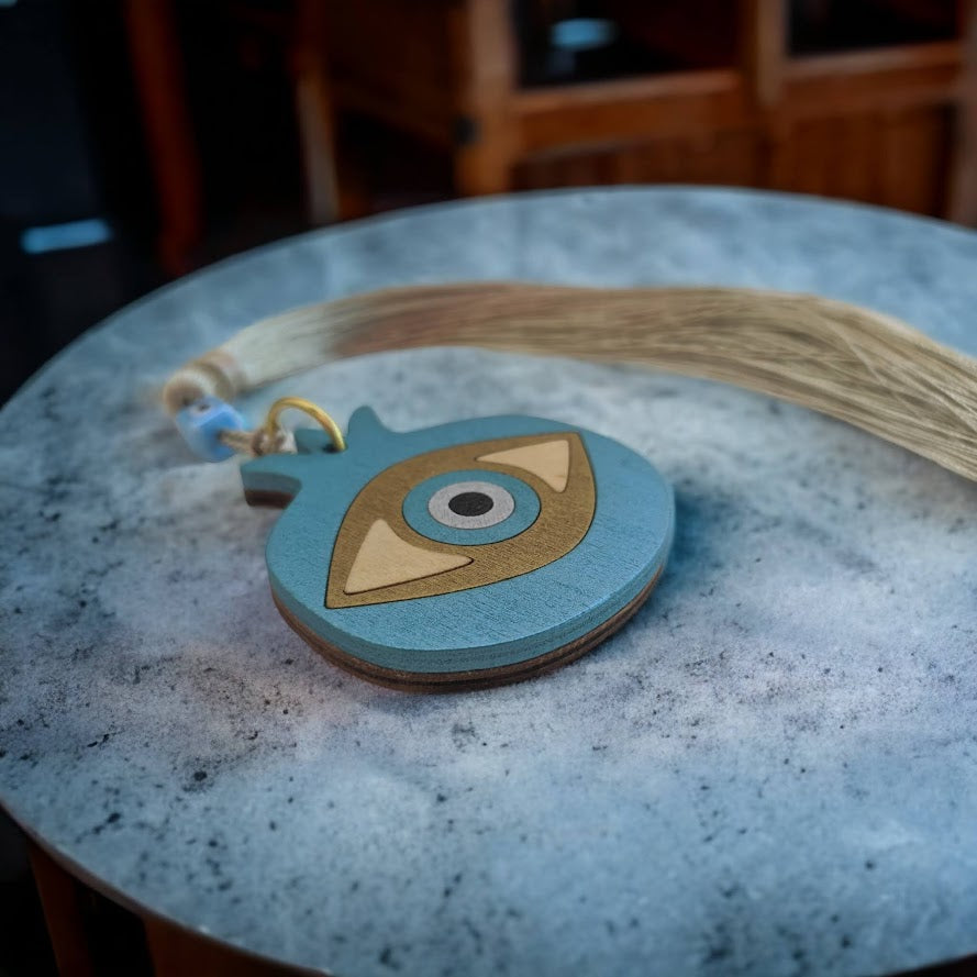 Décoration Table Oeil en bois et Pompon