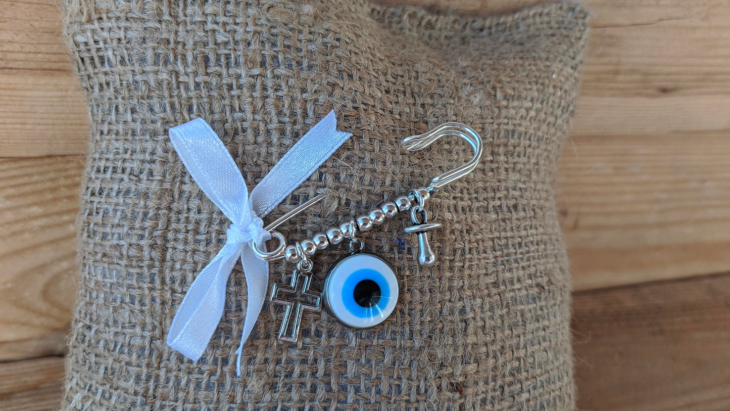 Broche bébé œil blanc- Protection bébé