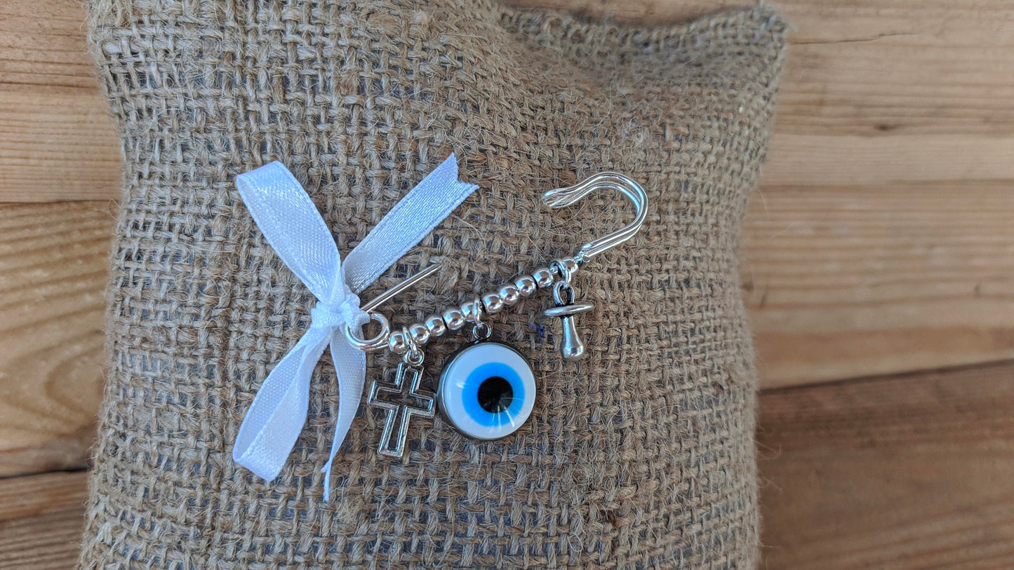 Broche bébé œil blanc- Protection bébé