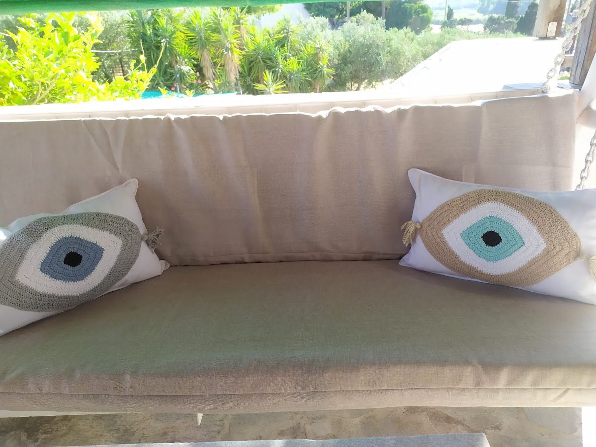 Housse de Coussin Oeil Bleu Dans 3 Coloris