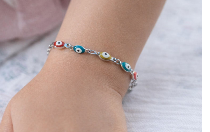 Bracelet bébé oeil bleu multicolore porte bonheur