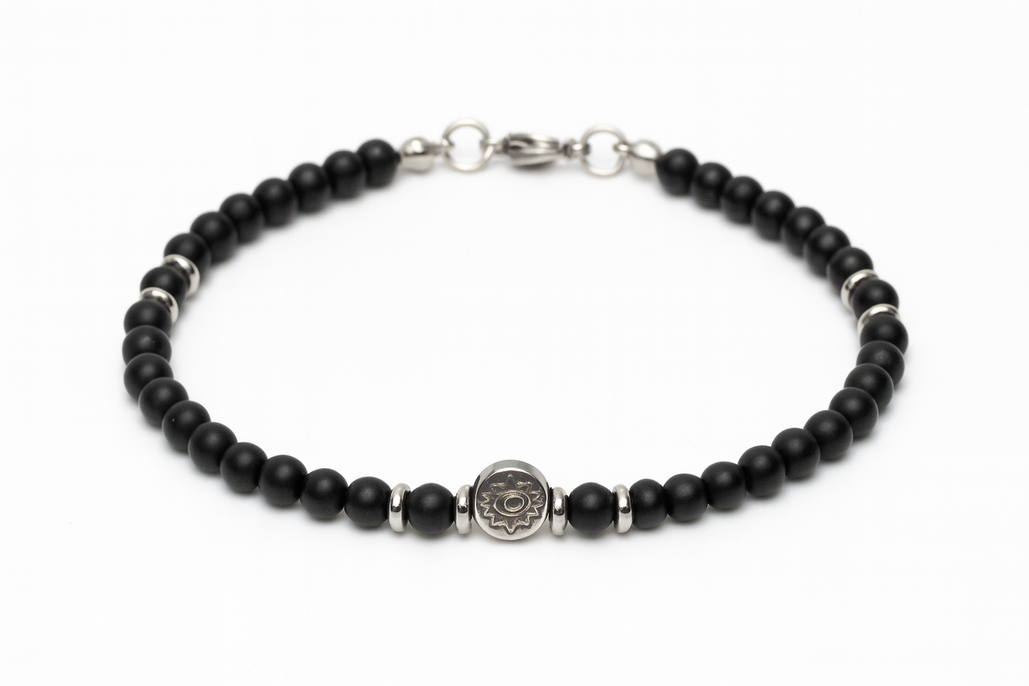 Handmade men's black onyx bracelet with a stainless steel evil eye charm, symbolic Greek protection jewelry.