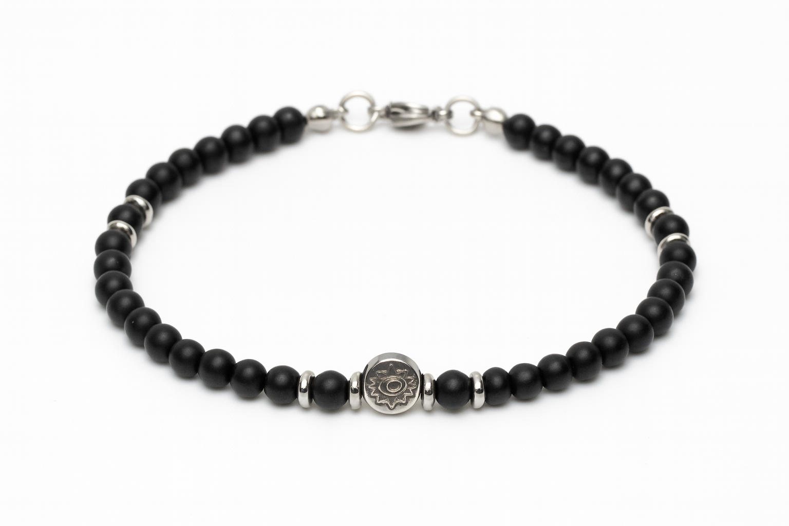 Handmade men's black onyx bracelet with a stainless steel evil eye charm, symbolic Greek protection jewelry.
