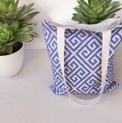 Beige and grey cotton canvas tote bag featuring the iconic Greek key motif, ideal for shopping, travel, or everyday use.