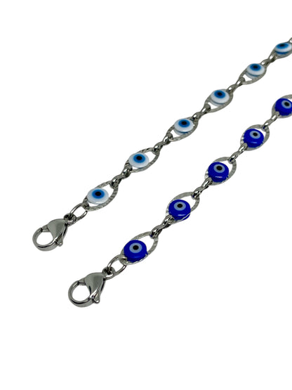 Silver chain with blue and white eye-shaped charms on a white background