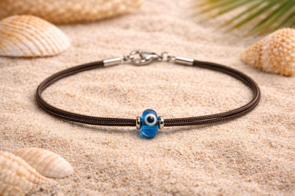 Bracelet œil bleu en paracorde, symbole de protection et d’élégance