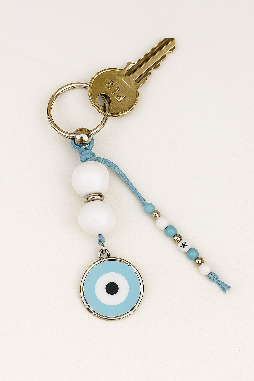 Bijou de Sac ou Porte clés Oeil Bleu ciel Porte-Bonheur – Élégance et Protection