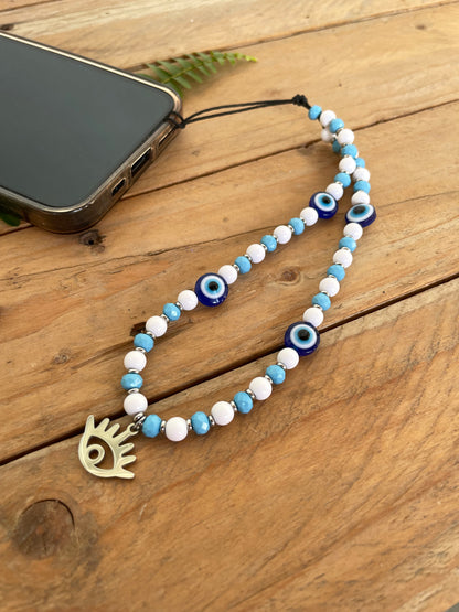 Greek evil eye phone wrist strap with handmade beaded design and lucky protection charm.