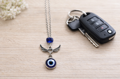 Bijou de rétroviseur ailes d'ange oeil bleu 