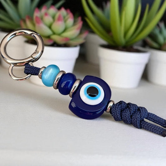 Blue Evil Eye Bag Charm – Elegance & Protection