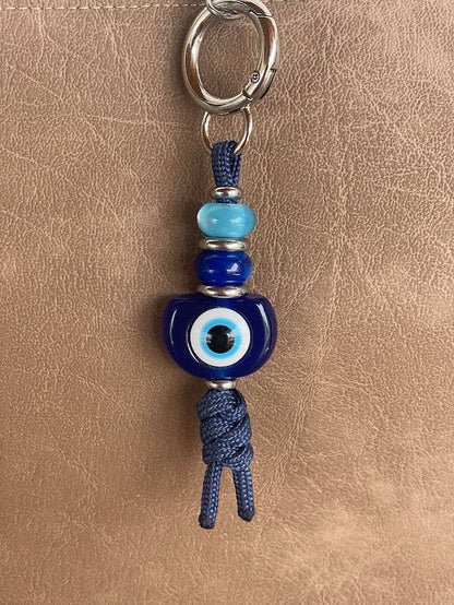 Blue Evil Eye Bag Charm – Elegance & Protection