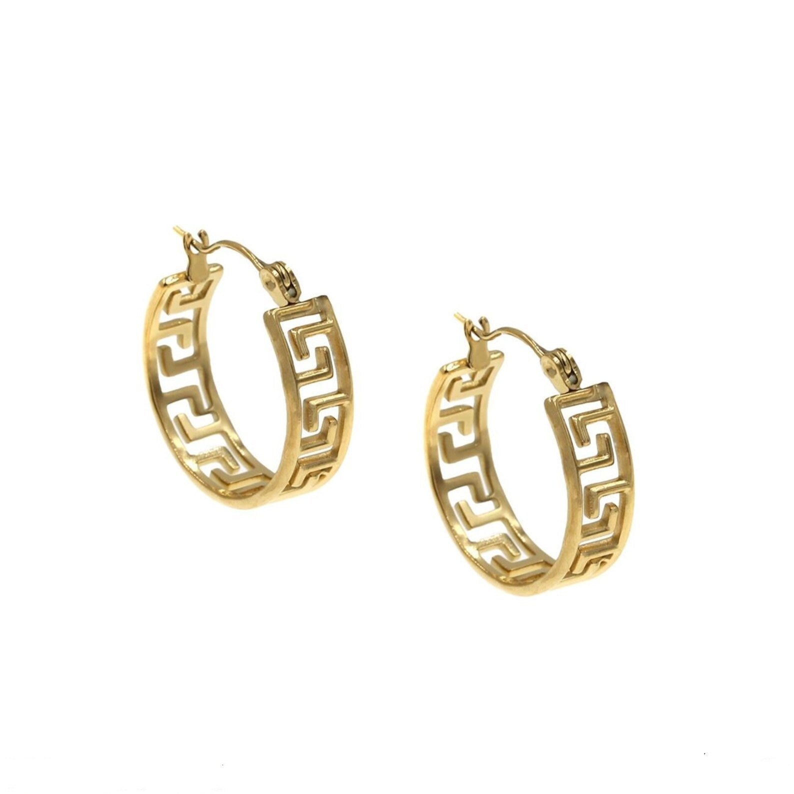 Gold hoop earrings with intricate design on a white background