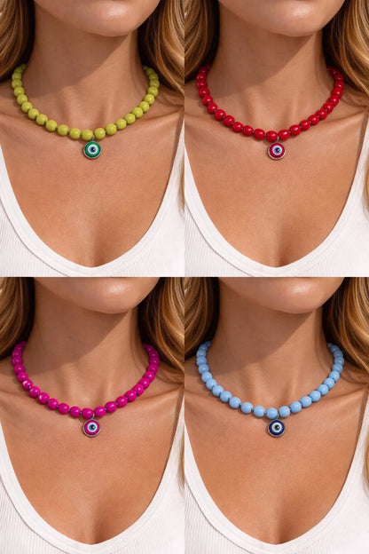 Handmade necklace featuring vibrant acrylic beads and a blue glass evil eye centerpiece, lightweight jewelry for beach days and casual outfits.