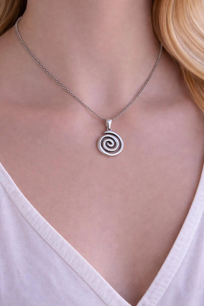 Minimalist Greek spiral pendant on a stainless steel chain, symbolic necklace inspired by ancient Greece.