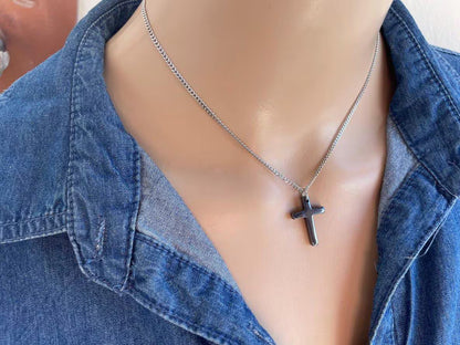 Black hematite cross pendant necklace on a stainless steel chain, minimalist Christian jewelry for men and women.