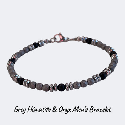 Gray hematite and onyx men's bracelet on a light gray background