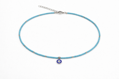 Collier Fin En Perles De Rocaille Turquoise Avec Pendentif Oeil Bleu