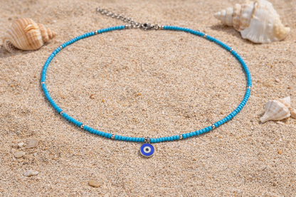 Collier Fin En Perles De Rocaille Turquoise Avec Pendentif Oeil Bleu