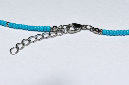 Collier Fin En Perles De Rocaille Turquoise Avec Pendentif Oeil Bleu