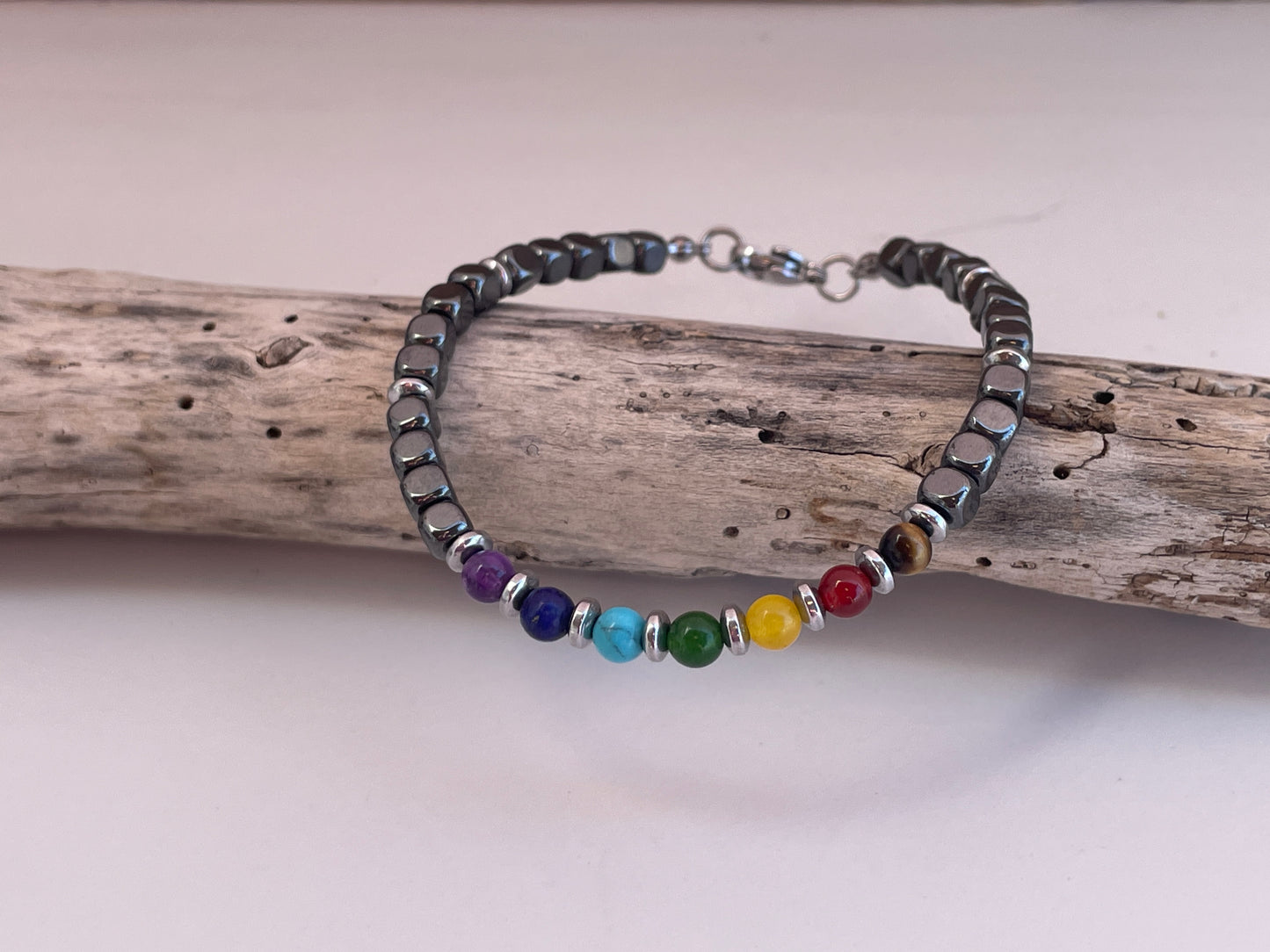 Bracelet with multicolored beads on a wooden surface