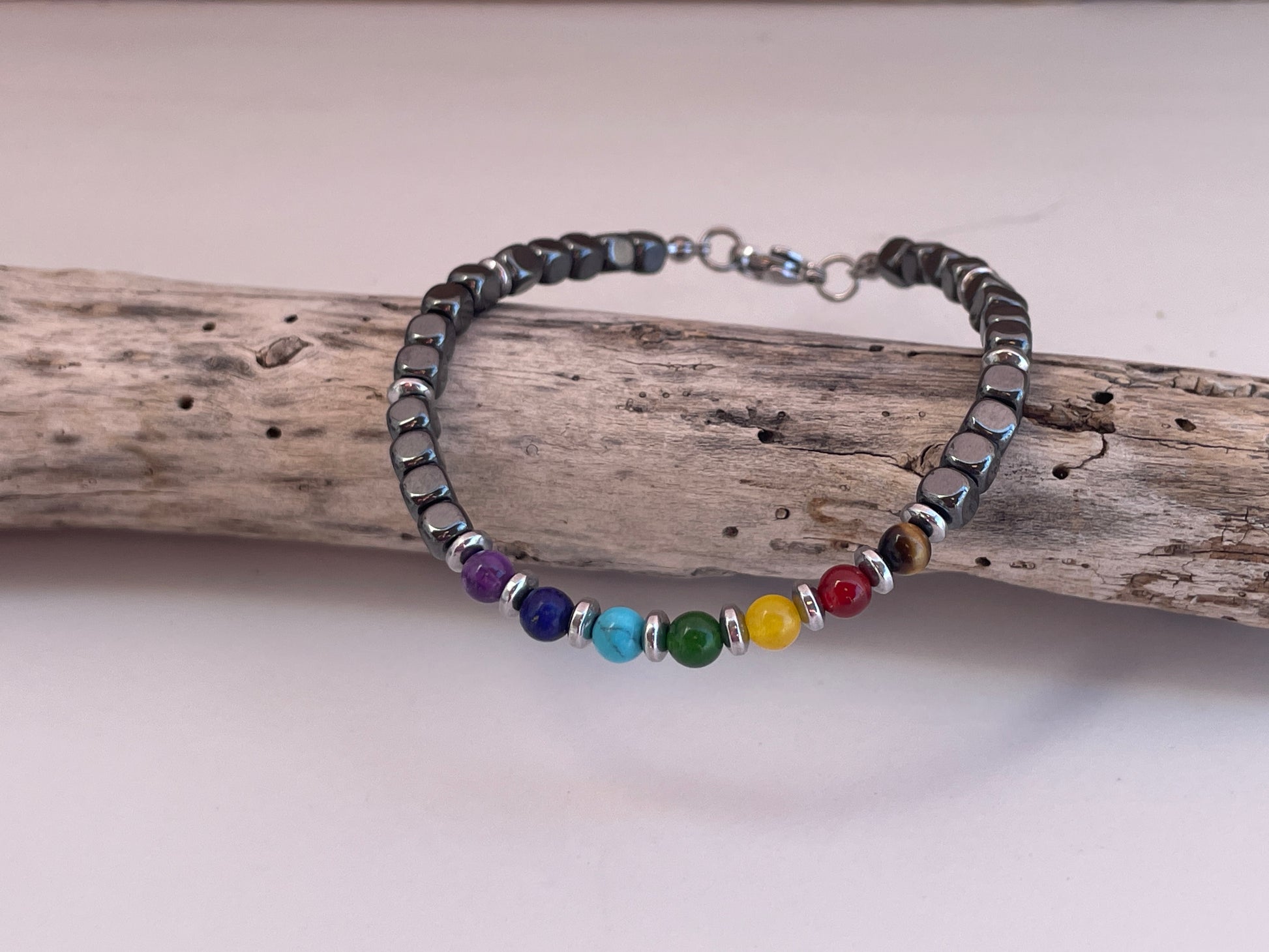 Bracelet with multicolored beads on a wooden surface