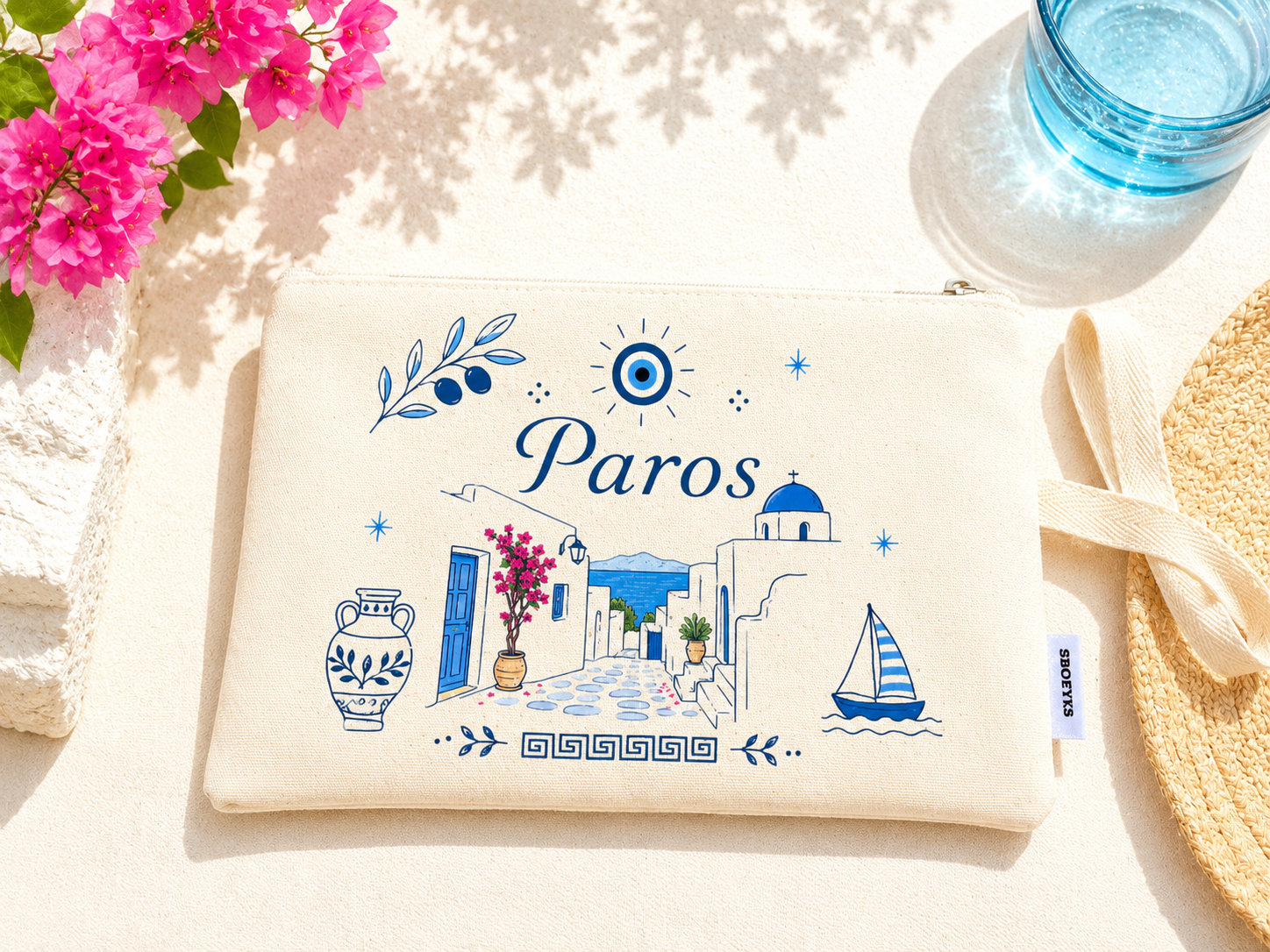 Product with 'Paros' design featuring Greek elements on a light surface with flowers and a glass.