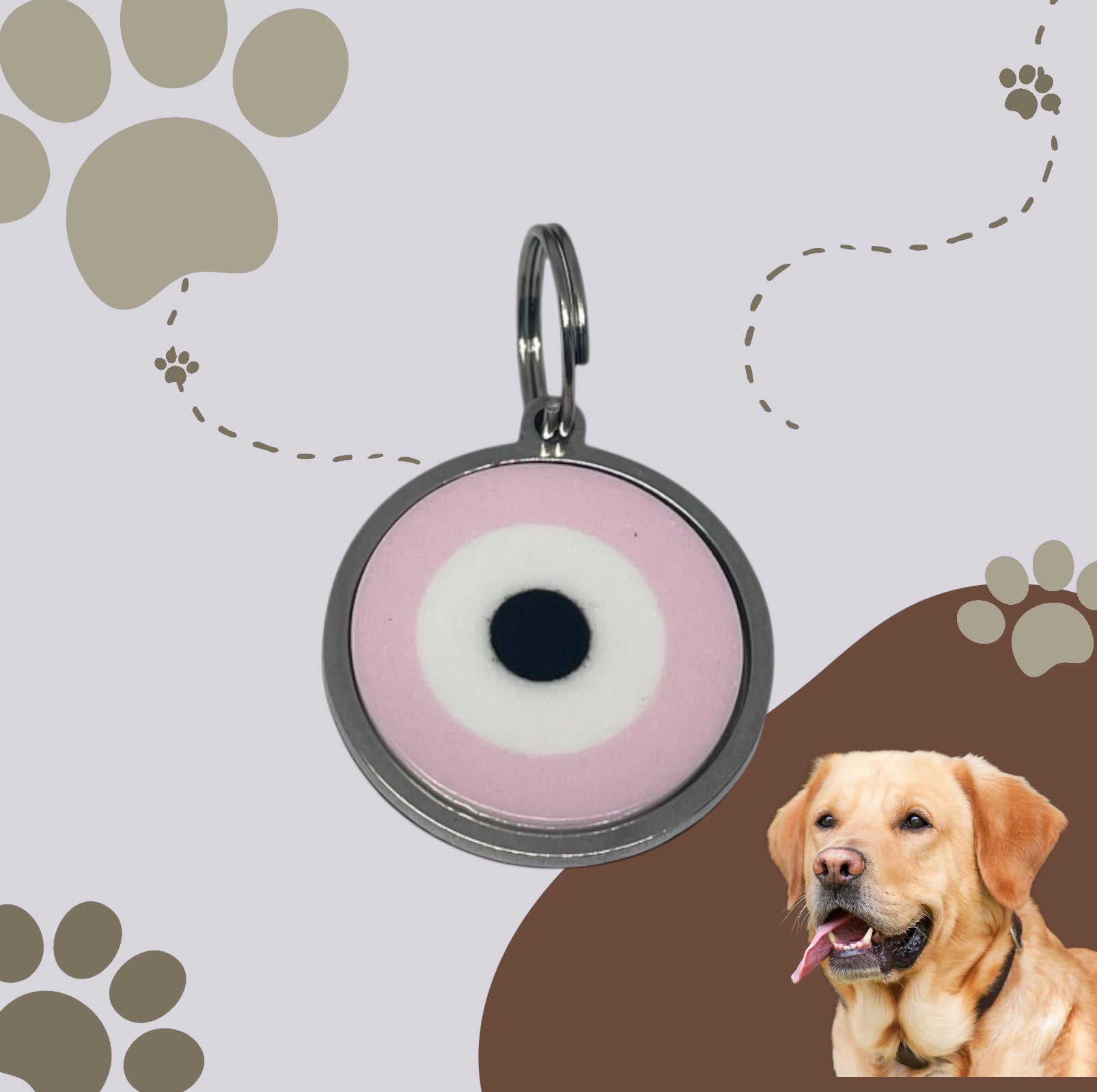 Pet tag with pink and black design on a gray background with paw prints, next to a dog.