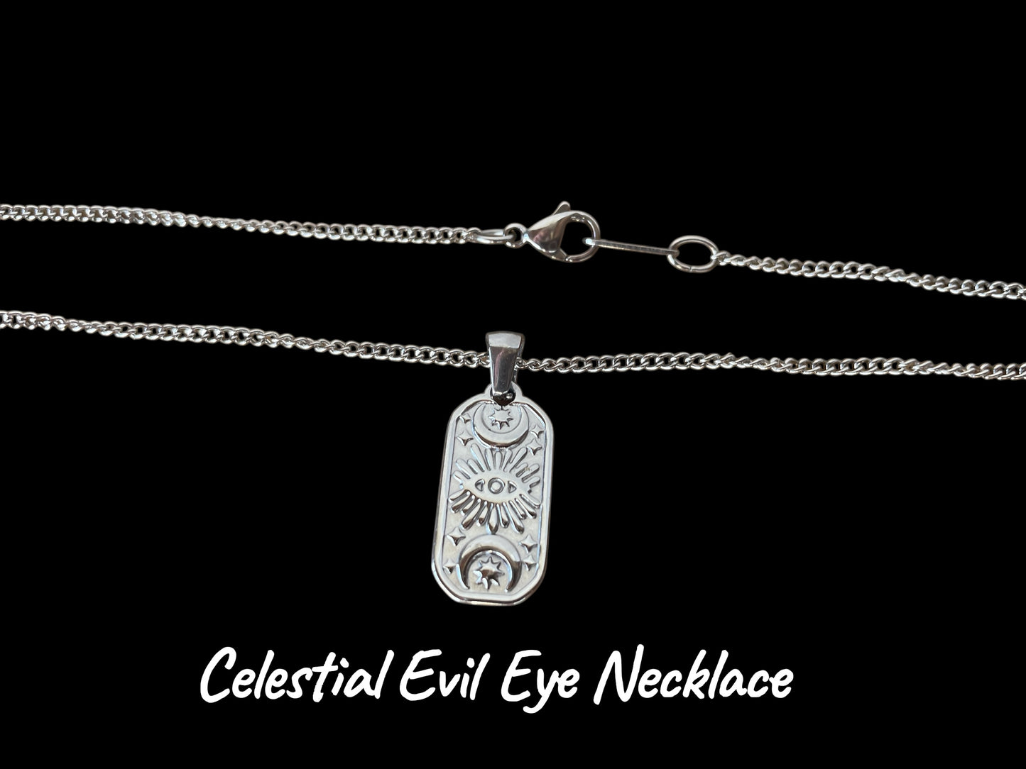 Silver 'Celestial Evil Eye' necklace on a black background