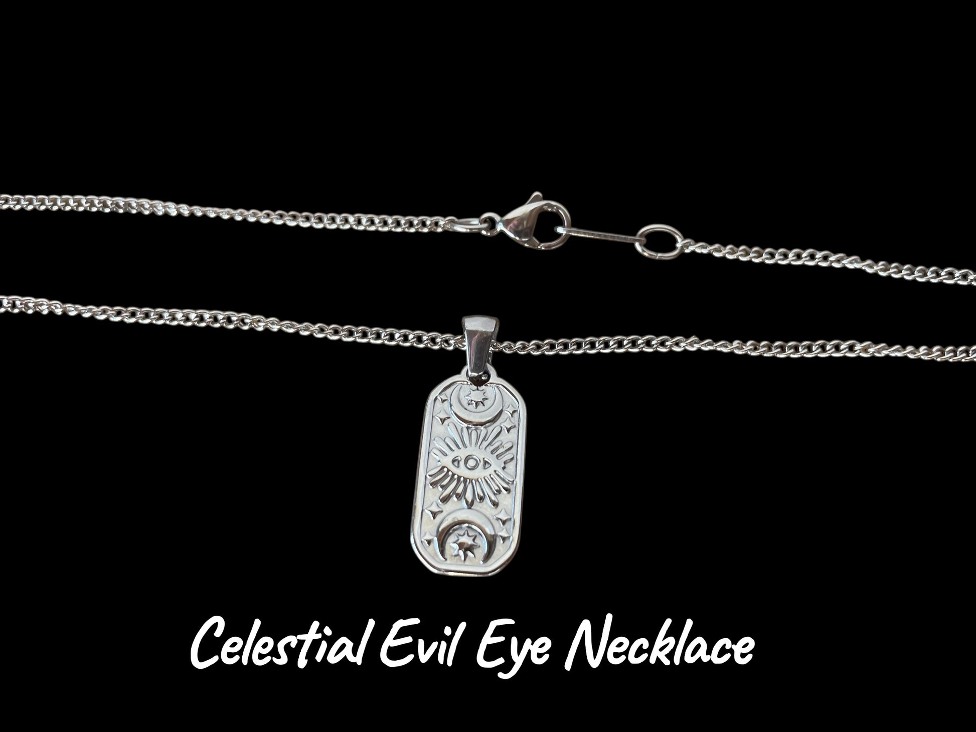 Silver 'Celestial Evil Eye' necklace on a black background