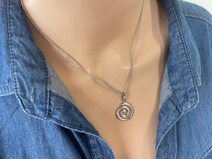 Greek spiral symbol pendant necklace on a stainless steel chain, timeless unisex jewelry inspired by Greek heritage.