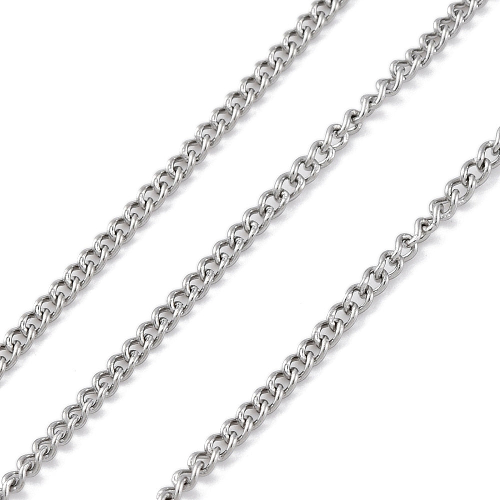 A close-up of a silver-toned metal chain running diagonally across a plain white background.