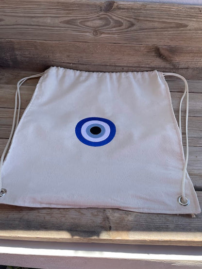 Canvas Drawstring Backpack with Embroidered Evil Eye