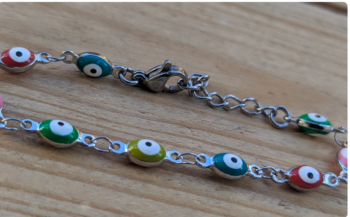 Bracelet bébé oeil bleu multicolore porte bonheur