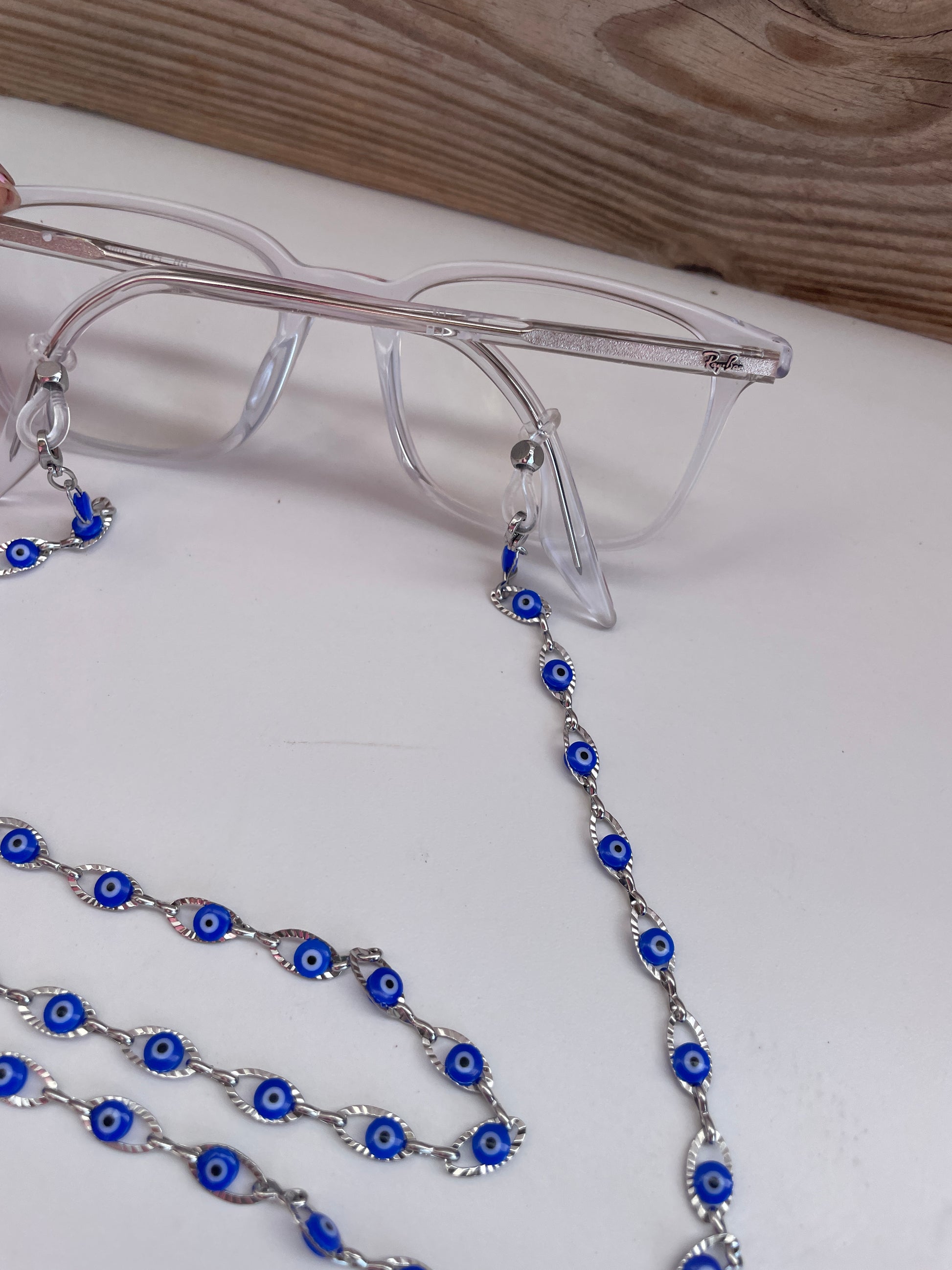 Necklace with blue evil eye beads on a mannequin bust
