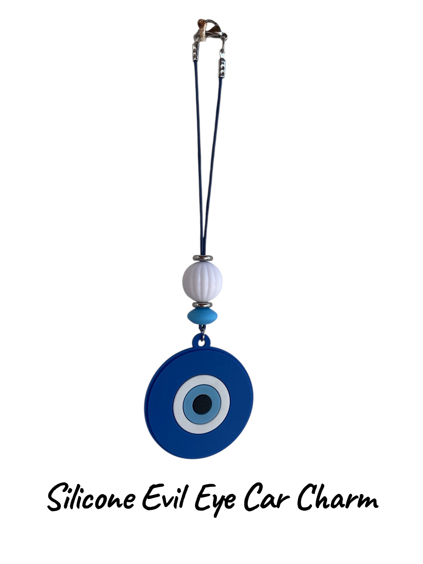 Silicone Evil Eye Car Charm with a white and blue design on a white background
