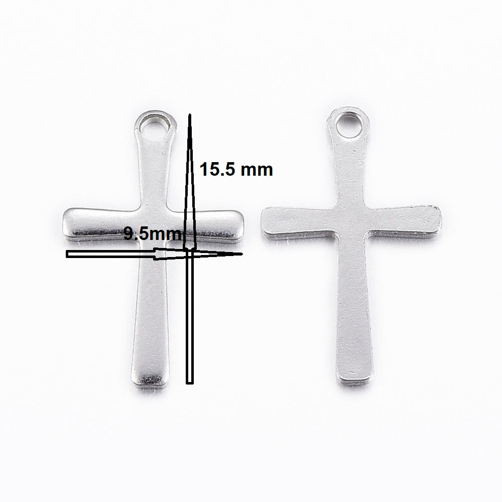 Two silver cross pendants with measurements on a white background
