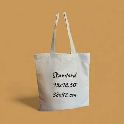 Beige tote bag with dimensions on a brown background