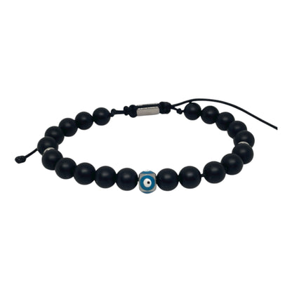 Black beaded bracelet with a blue evil eye charm on a white background