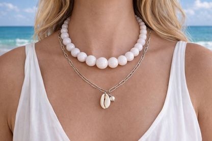 Handmade white statement necklace featuring large acrylic beads, lightweight women's jewelry made in Greece for modern everyday wear.