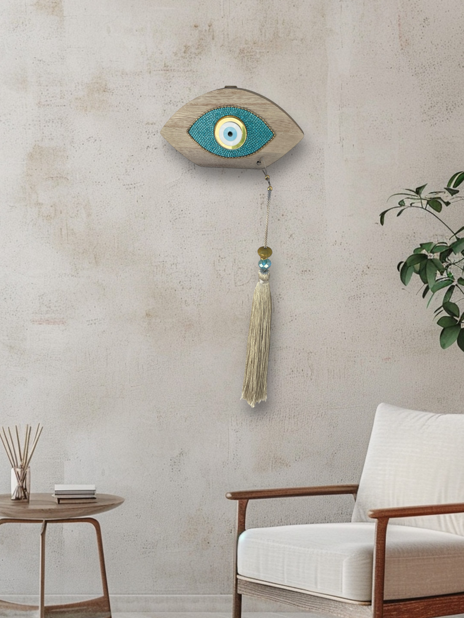 Decorative wall hanging with eye design on a textured wall in a living room setting.