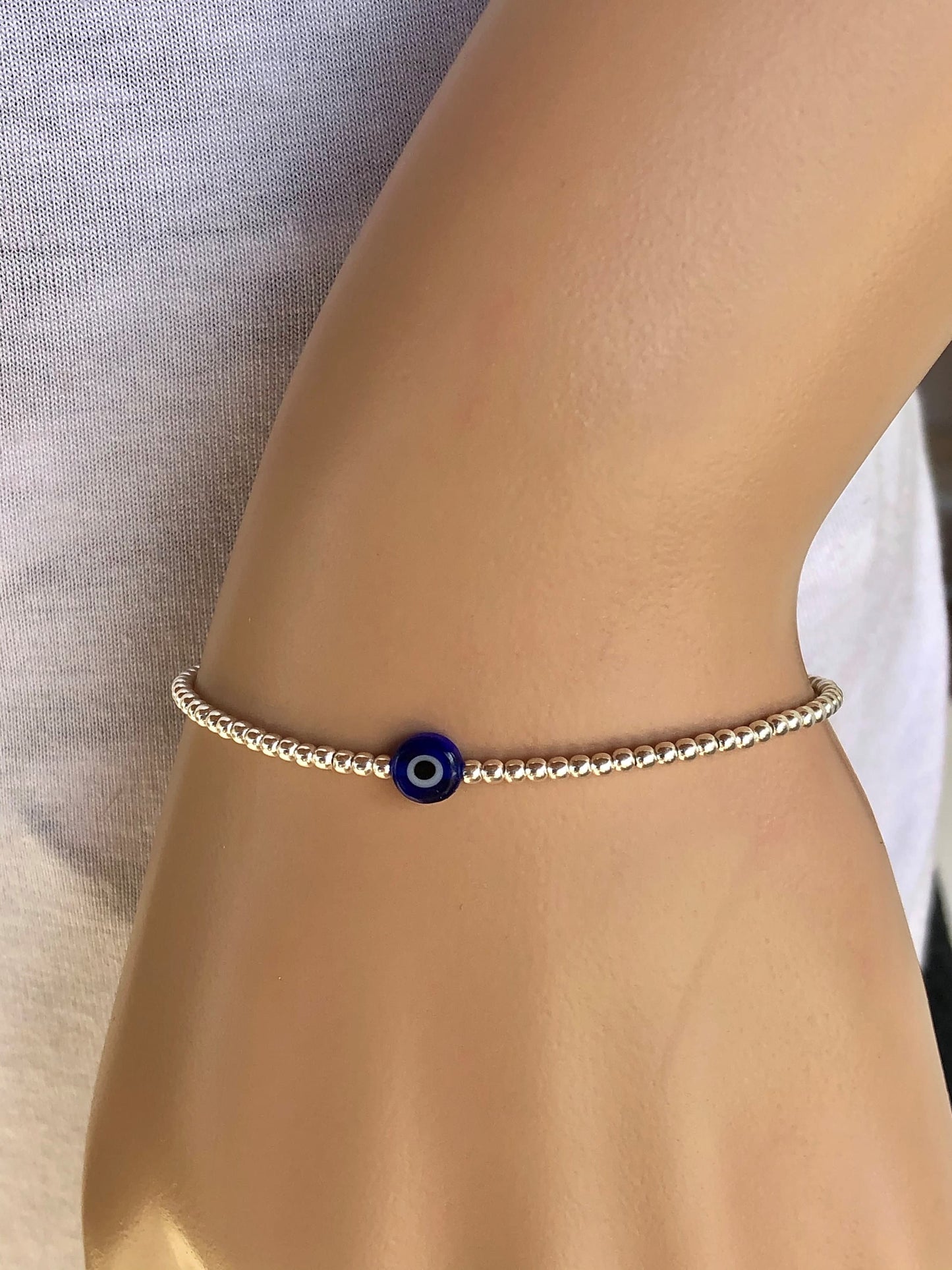 Silver evil eye beaded bracelet
