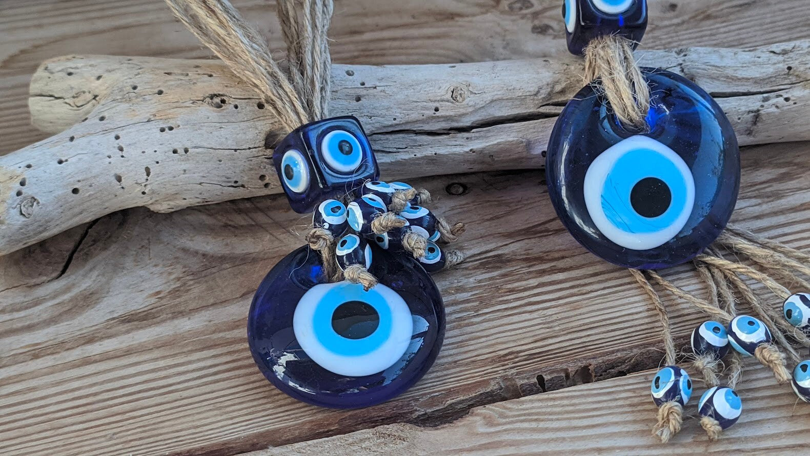 glass evil eye wall hanging in two styles for your house